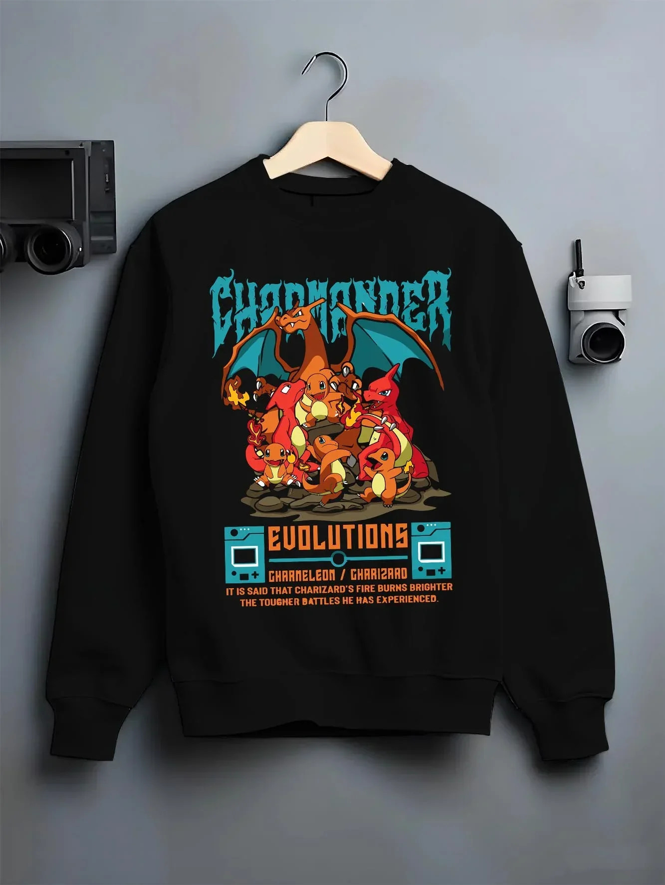 Black crewneck sweatshirt on hanger with Charizard Hoodie Pokémon Evolutions Retro Flame Hero graphic premium wear.
