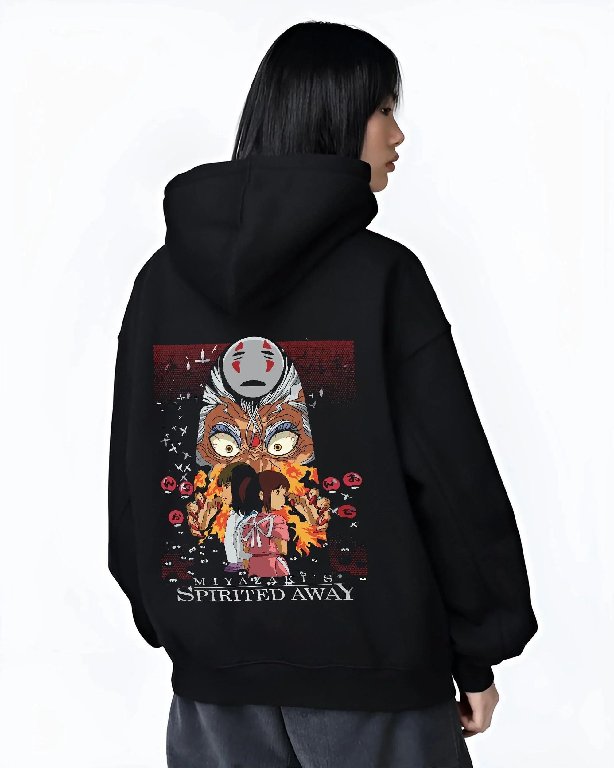 Black hoodie worn by female model, back view with Spirited Away Hoodie No Face Studio Ghibli Poster graphic bold anime graphic.