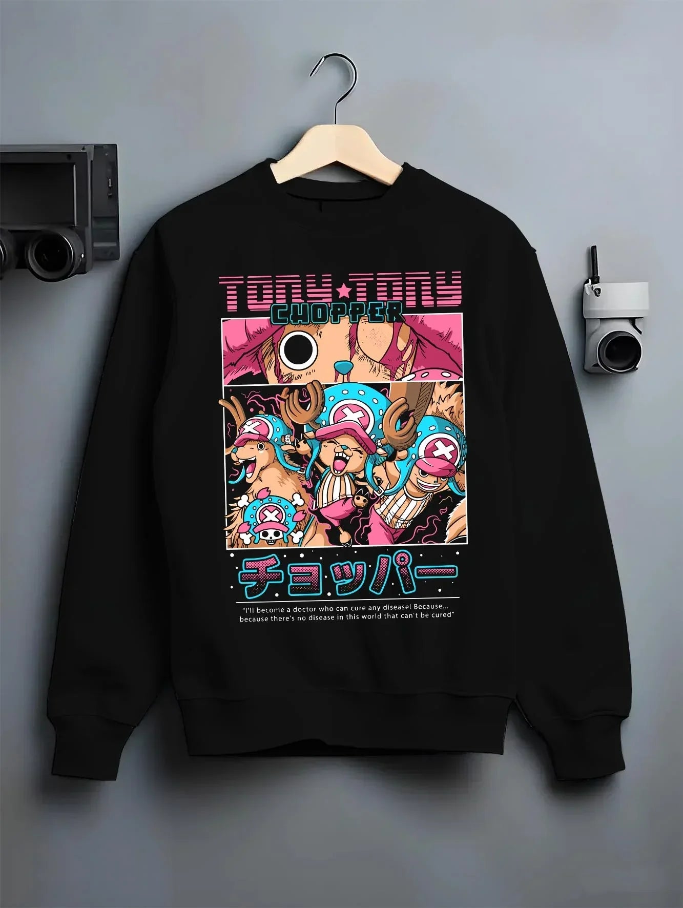 Black crewneck sweatshirt on hanger with Chopper Hoodie One Piece Doctor Retro Pirate Collage graphic streetwear graphic.