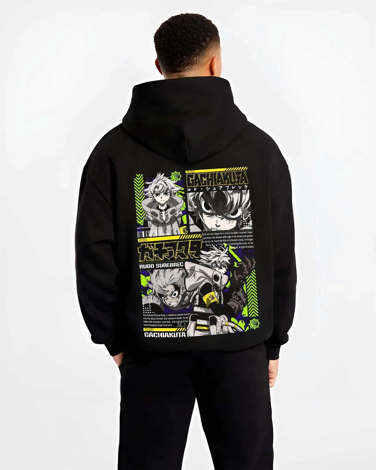 Black hoodie worn by male model, back view with Gachiakuta Rudo Hoodie Rebel Fighter Anime Jumper graphic bold anime graphic.