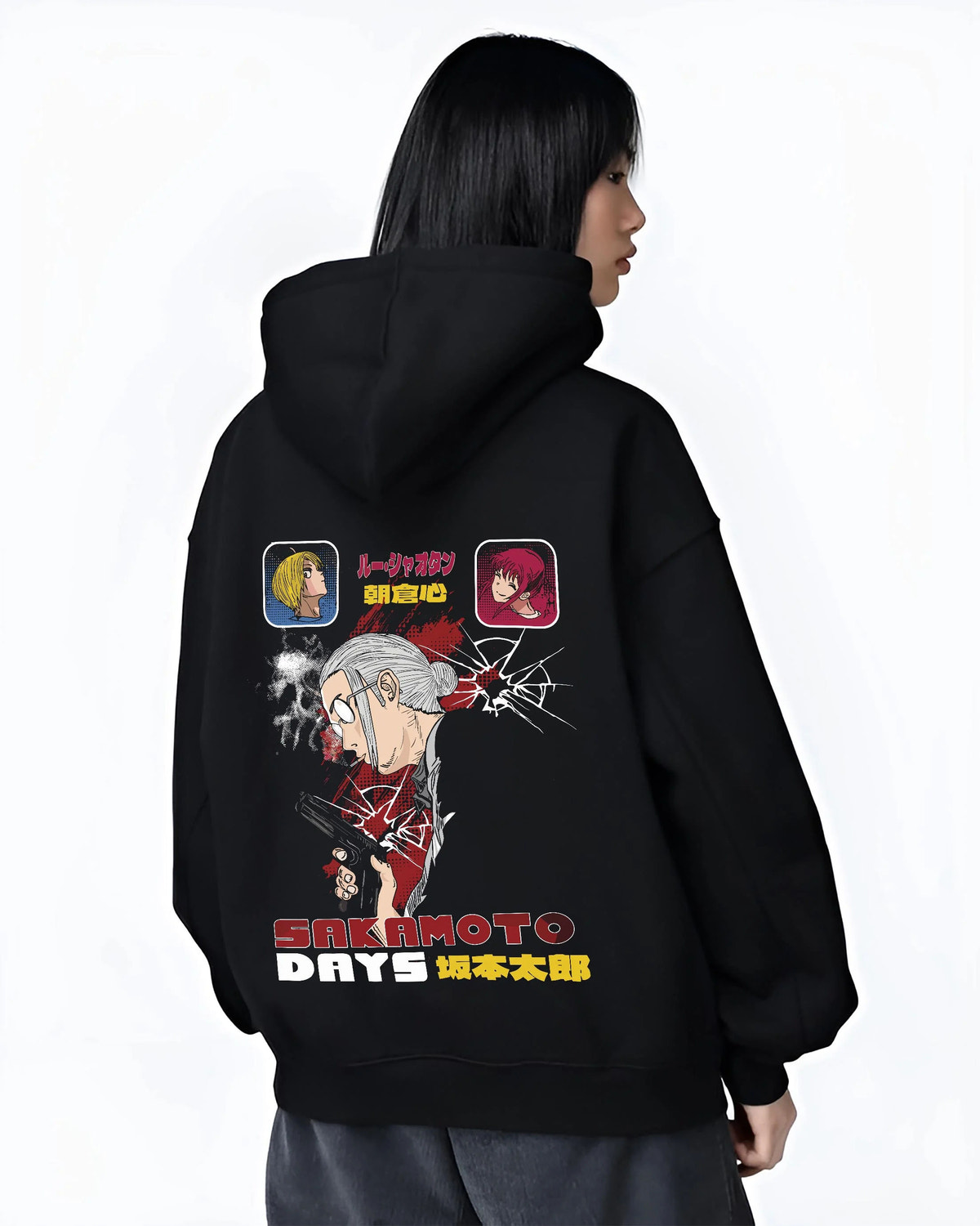Black hoodie worn by female model from the back featuring Sakamoto Days combat manga artwork.