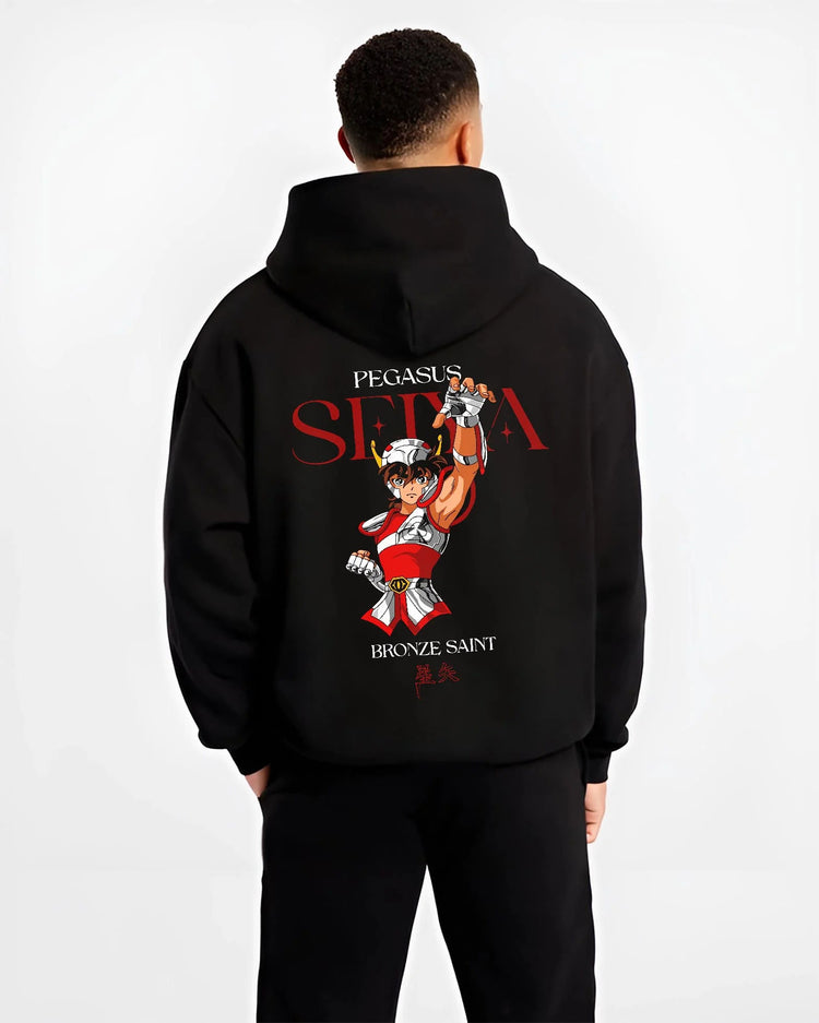 Black hoodie worn by male model from the back featuring Pegasus Seiya Saint Seiya Bronze Saint cosmos artwork.