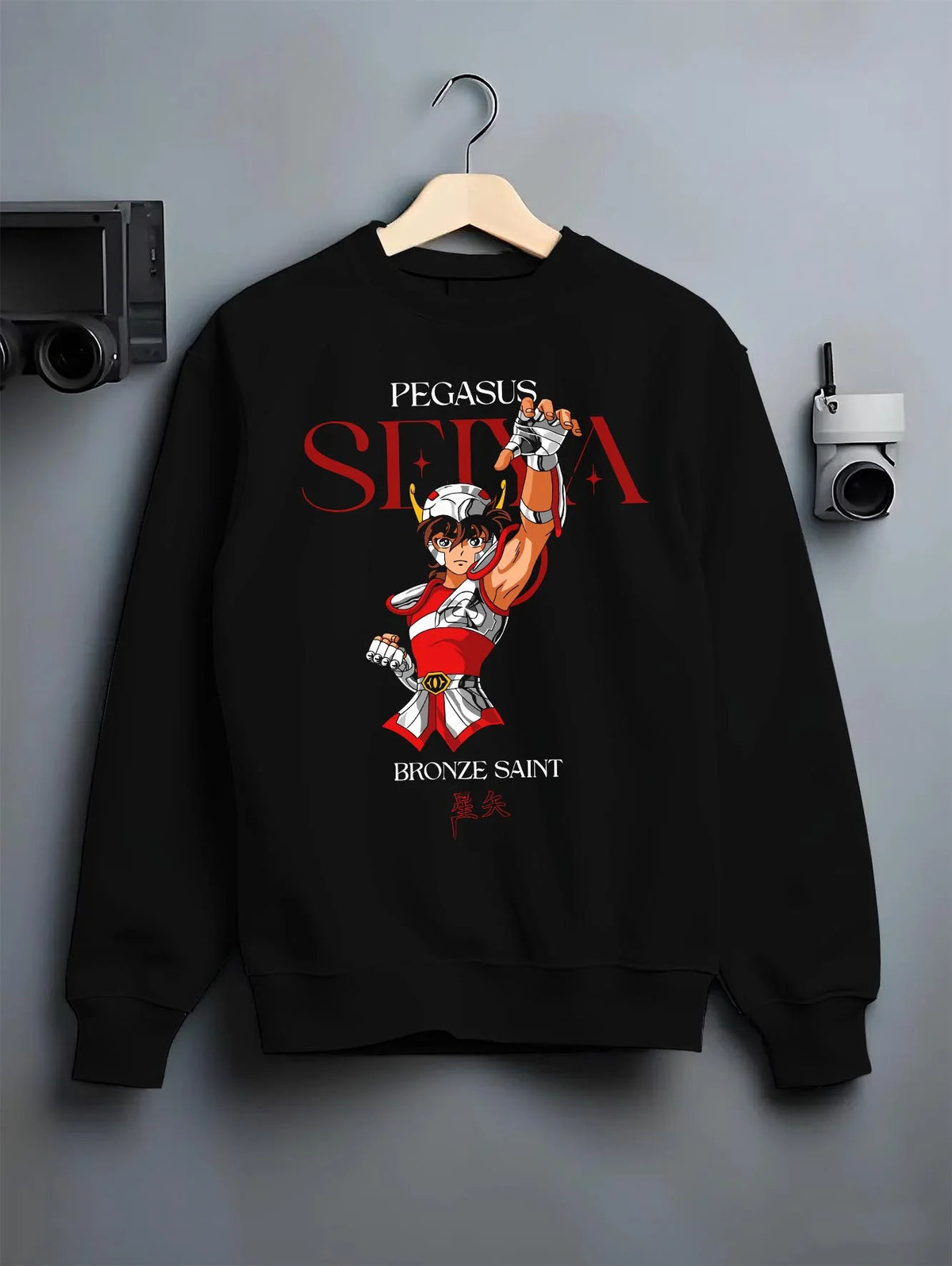 Black crewneck sweatshirt on hanger featuring Pegasus Seiya Saint Seiya Bronze Saint cosmos artwork.