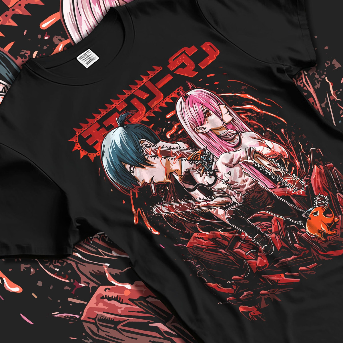 Black T-shirt laid flat with natural fabric folds, featuring Chainsaw Man anime poster inspired design of Aki and Power in retro manga horror panel style.