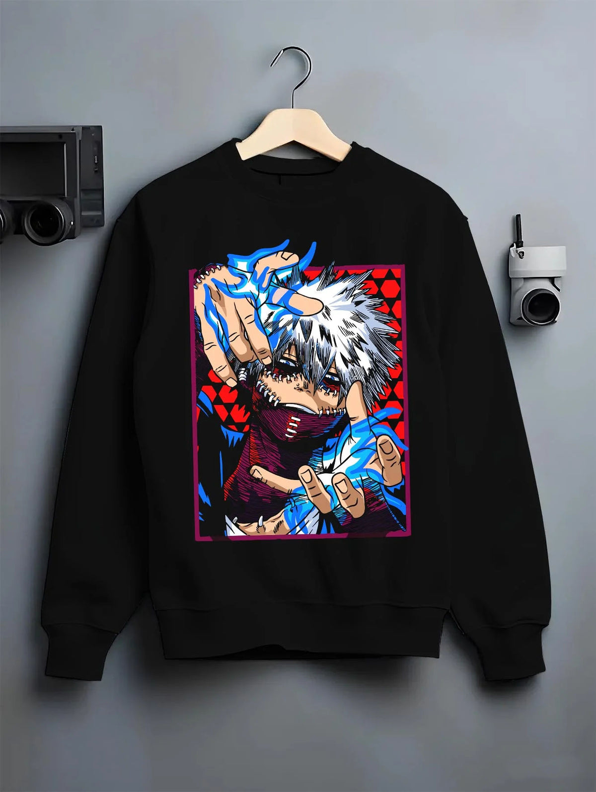 Black crewneck sweatshirt on hanger featuring Dabi My Hero Academia blue flame villain artwork.