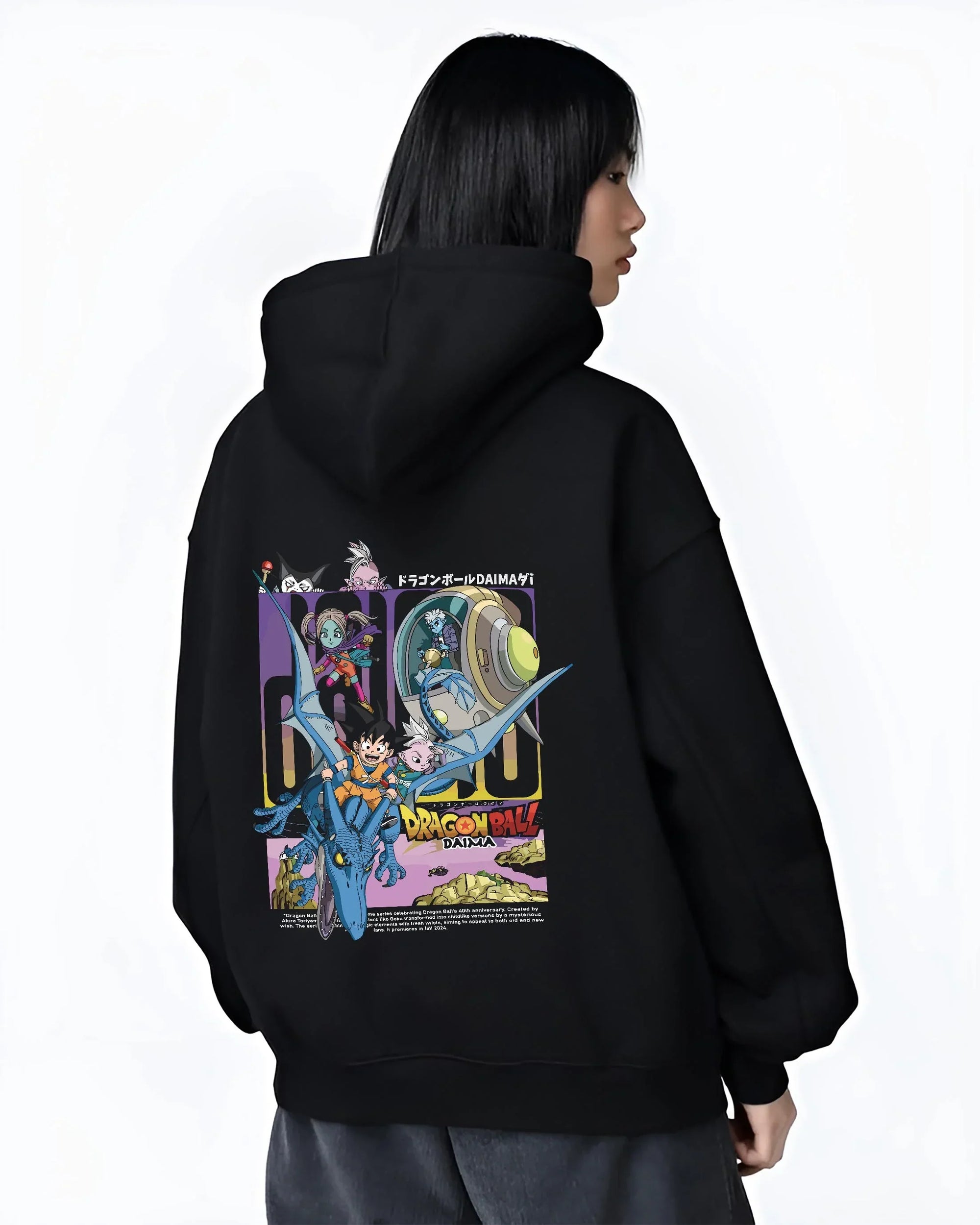 Black hoodie worn by female model, back view with Dragon Ball Hoodie Daima Anime Retro Poster Scene graphic Goku themed artwork.