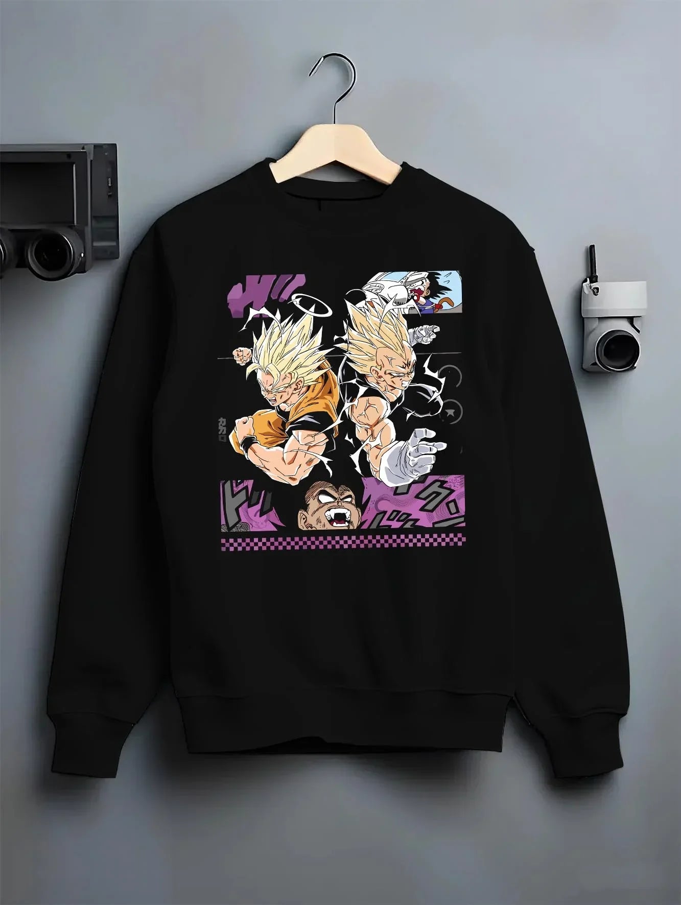 Black crewneck sweatshirt on hanger with Goku Hoodie Dragon Ball Z Super Saiyan Epic Pose graphic premium wear.