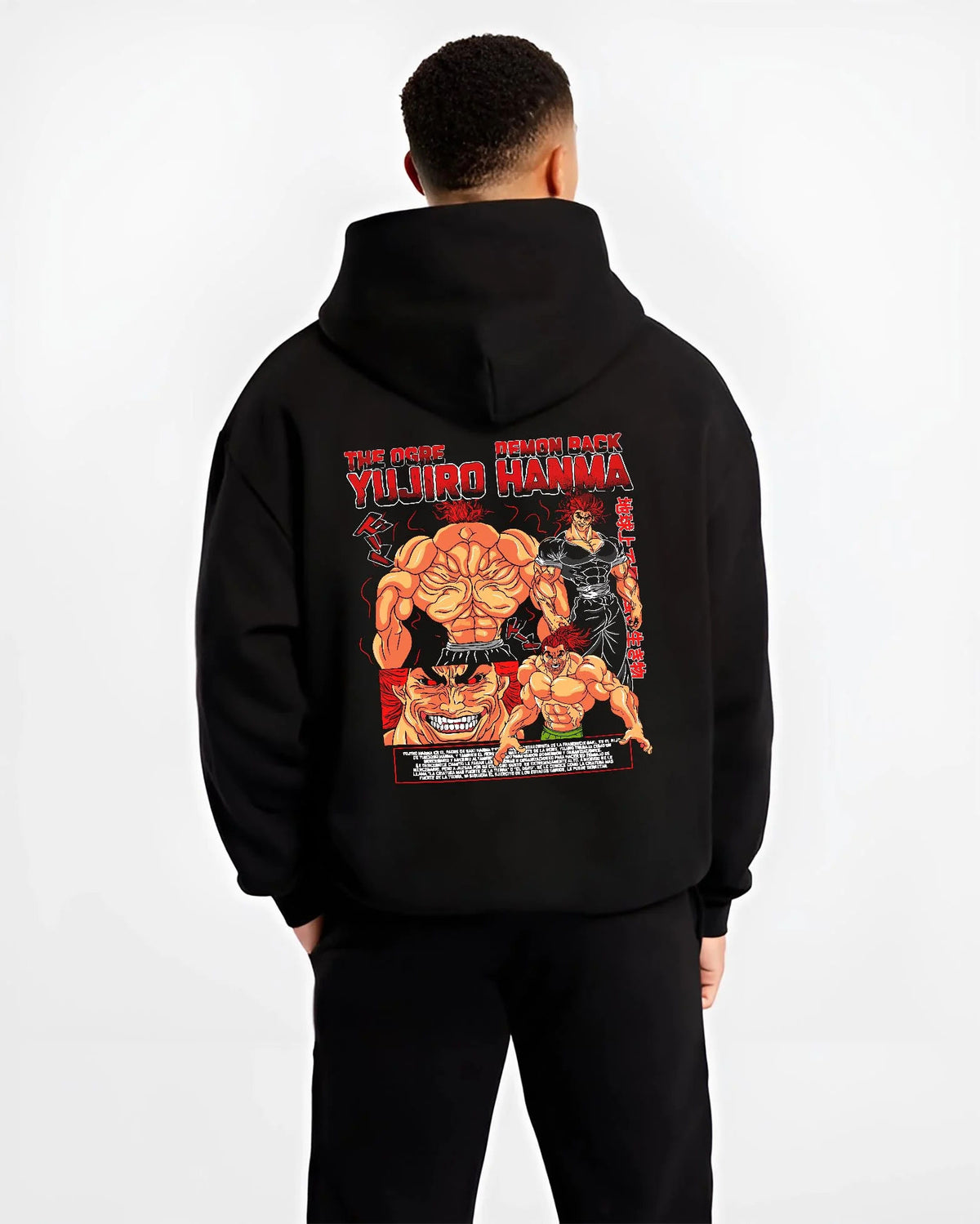 Black hoodie worn by male model from the back featuring Yujiro Hanma Baki demon back battle artwork.