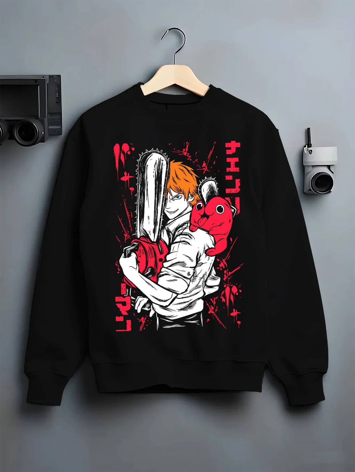 Black crewneck sweatshirt on hanger showing Denji transformed with Pochita from Chainsaw Man: red-and-black poster