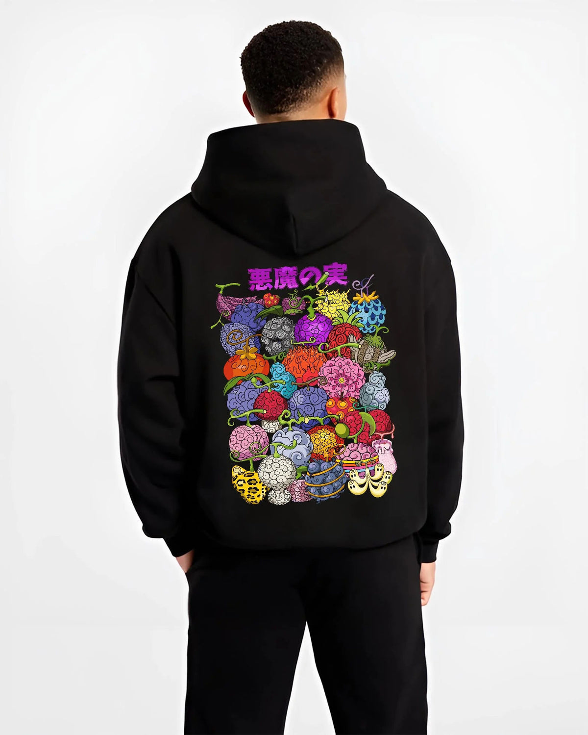 Black hoodie worn by male model from the back featuring One Piece devil fruit collage artwork.