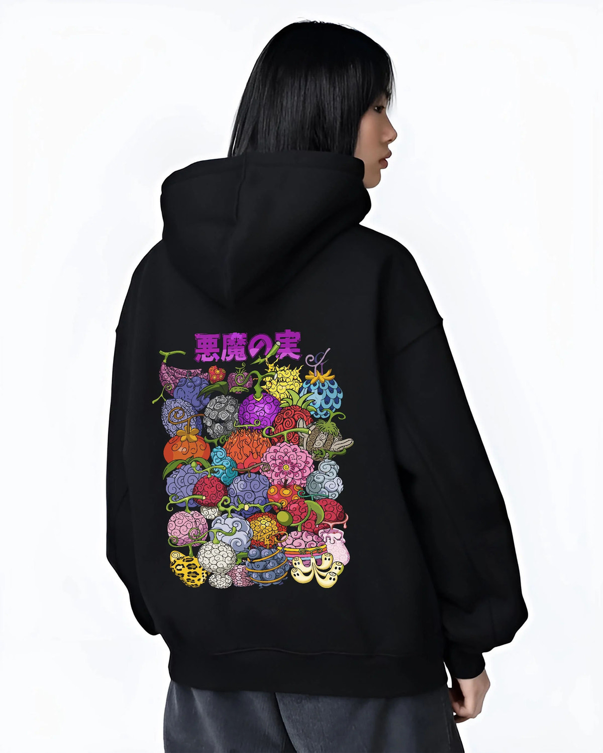 Black hoodie worn by female model from the back featuring One Piece devil fruit collage artwork.