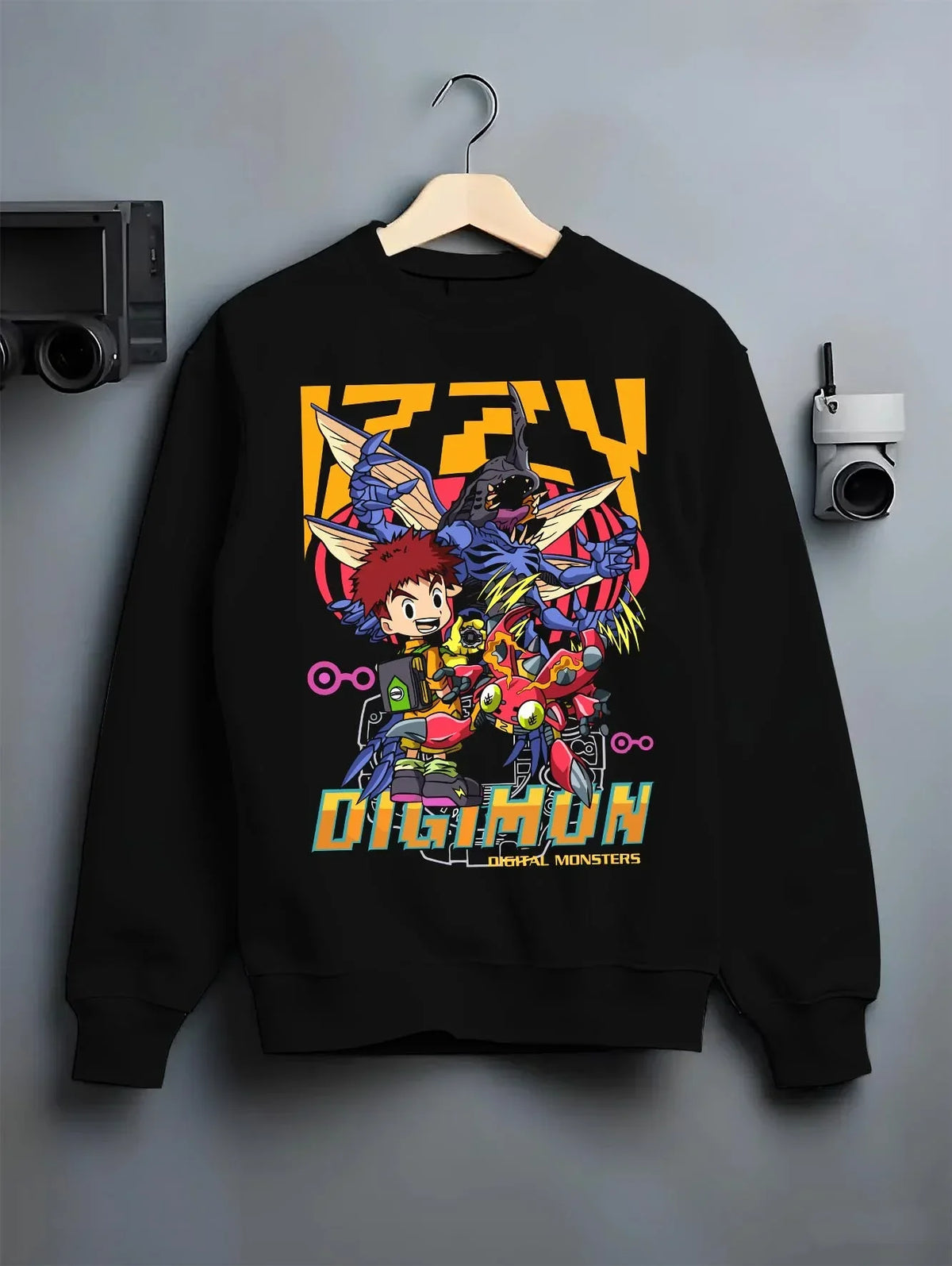 Black crewneck sweatshirt on hanger with Digimon Hoodie Tai and Agumon Digital Monsters Print graphic streetwear graphic.