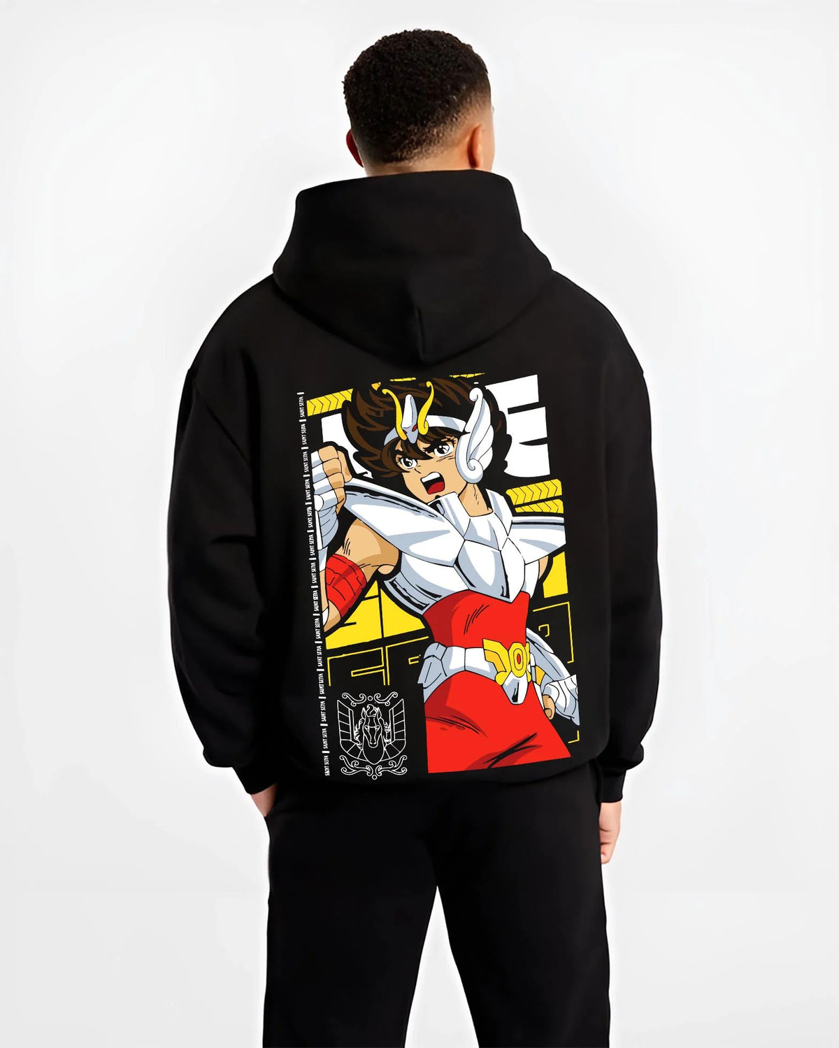 Black hoodie worn by male model from the back featuring Pegasus Seiya Saint Seiya divine armor artwork.