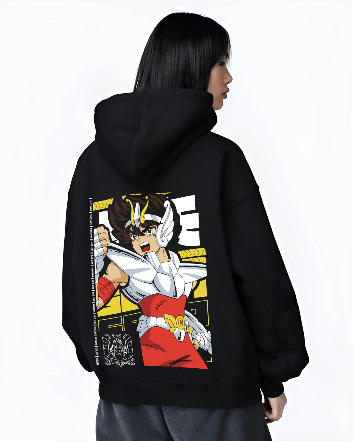Black hoodie worn by female model from the back featuring Pegasus Seiya Saint Seiya divine armor artwork.