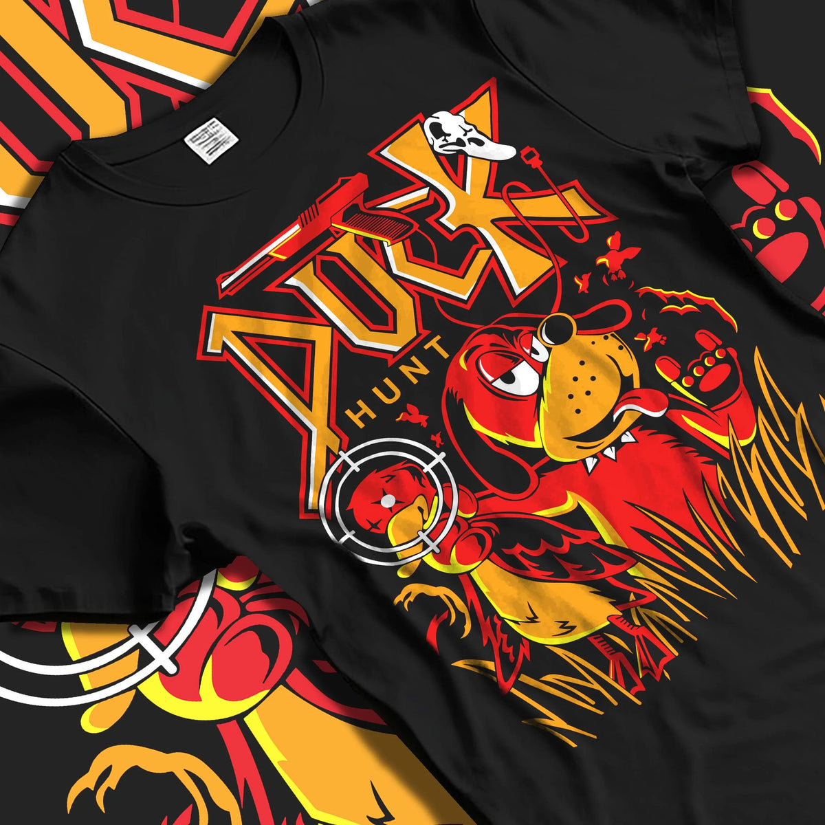 Black T-shirt laid flat with natural folds featuring Duck Hunt retro gaming dog artwork.