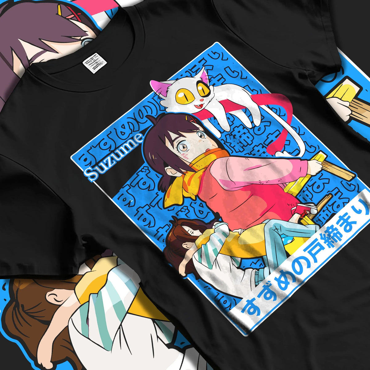 Black T-shirt laid flat with natural folds featuring Suzume sky door fantasy artwork.