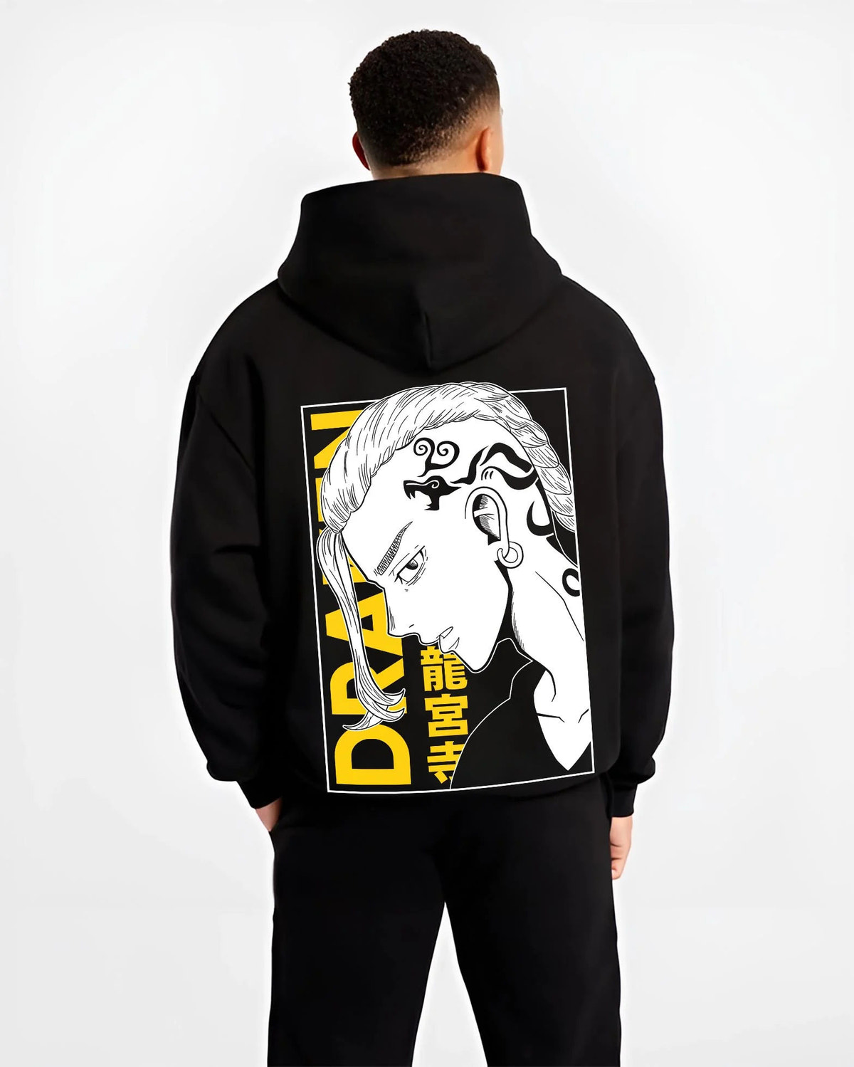 Black hoodie worn by male model from the back featuring Draken Tokyo Revengers Toman gang artwork.