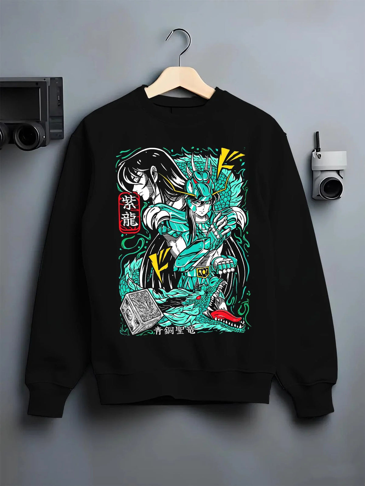 Black crewneck sweatshirt on hanger featuring Dragon Shiryu Saint Seiya dragon shield artwork.