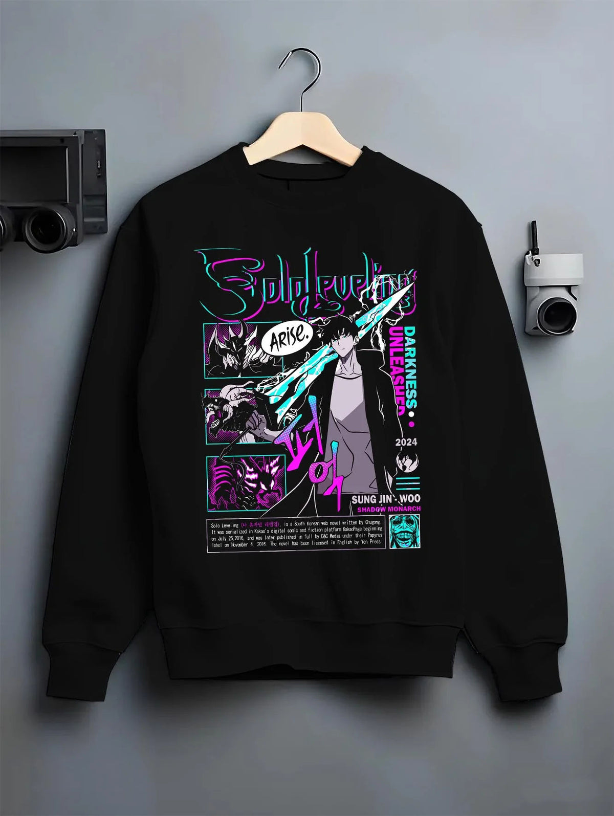Black crewneck sweatshirt on hanger featuring Sung Jin-Woo Solo Leveling Arise shadow monarch artwork.