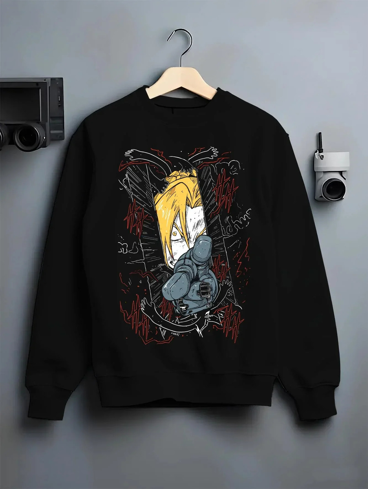 Black crewneck sweatshirt on hanger with Edward Elric Hoodie Fullmetal Alchemist Magic Circle graphic premium wear.