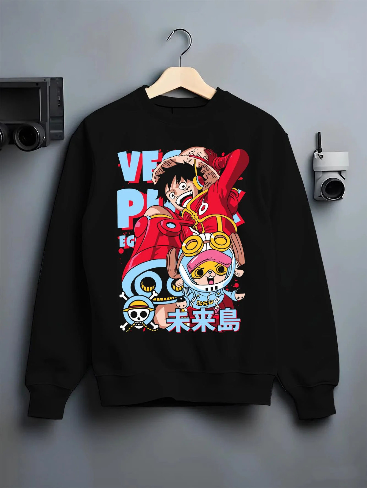 Black crewneck sweatshirt on hanger featuring Luffy One Piece Egghead future pirate artwork.