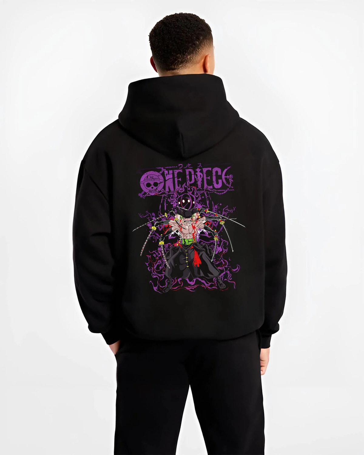 Black hoodie worn by male model from the back featuring Roronoa Zoro One Piece Enma King of Hell artwork.