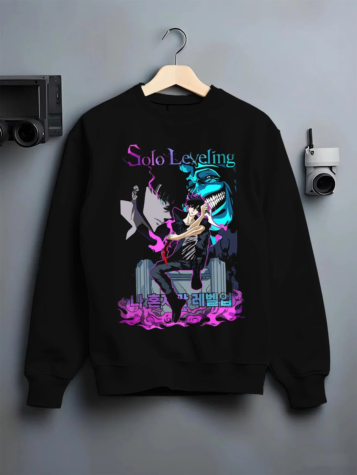Black crewneck sweatshirt on hanger featuring Sung Jin-Woo Solo Leveling shadow extract artwork.