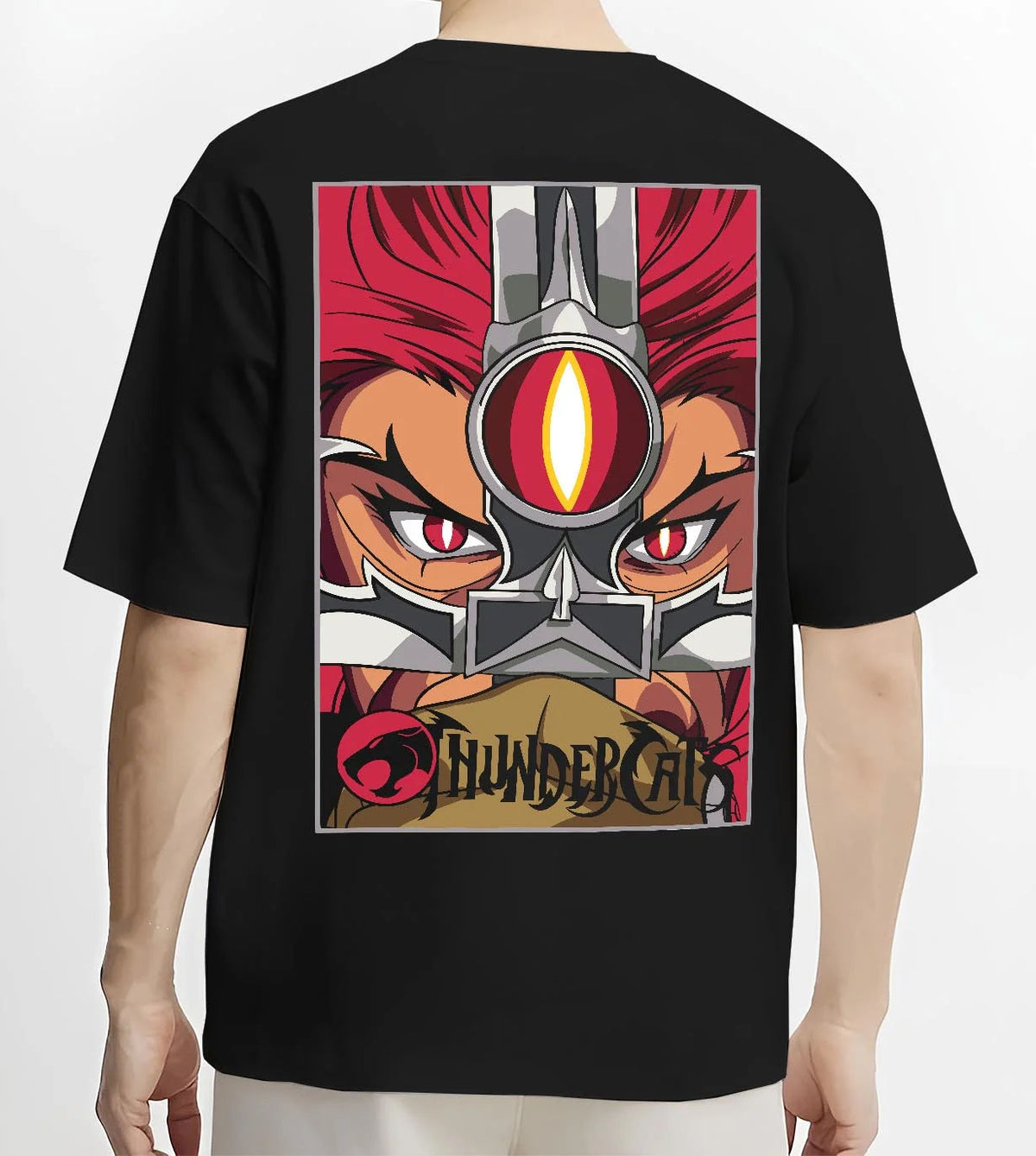 Black T-shirt worn by male model from the back featuring Thundercats Eye of Thundera artwork.