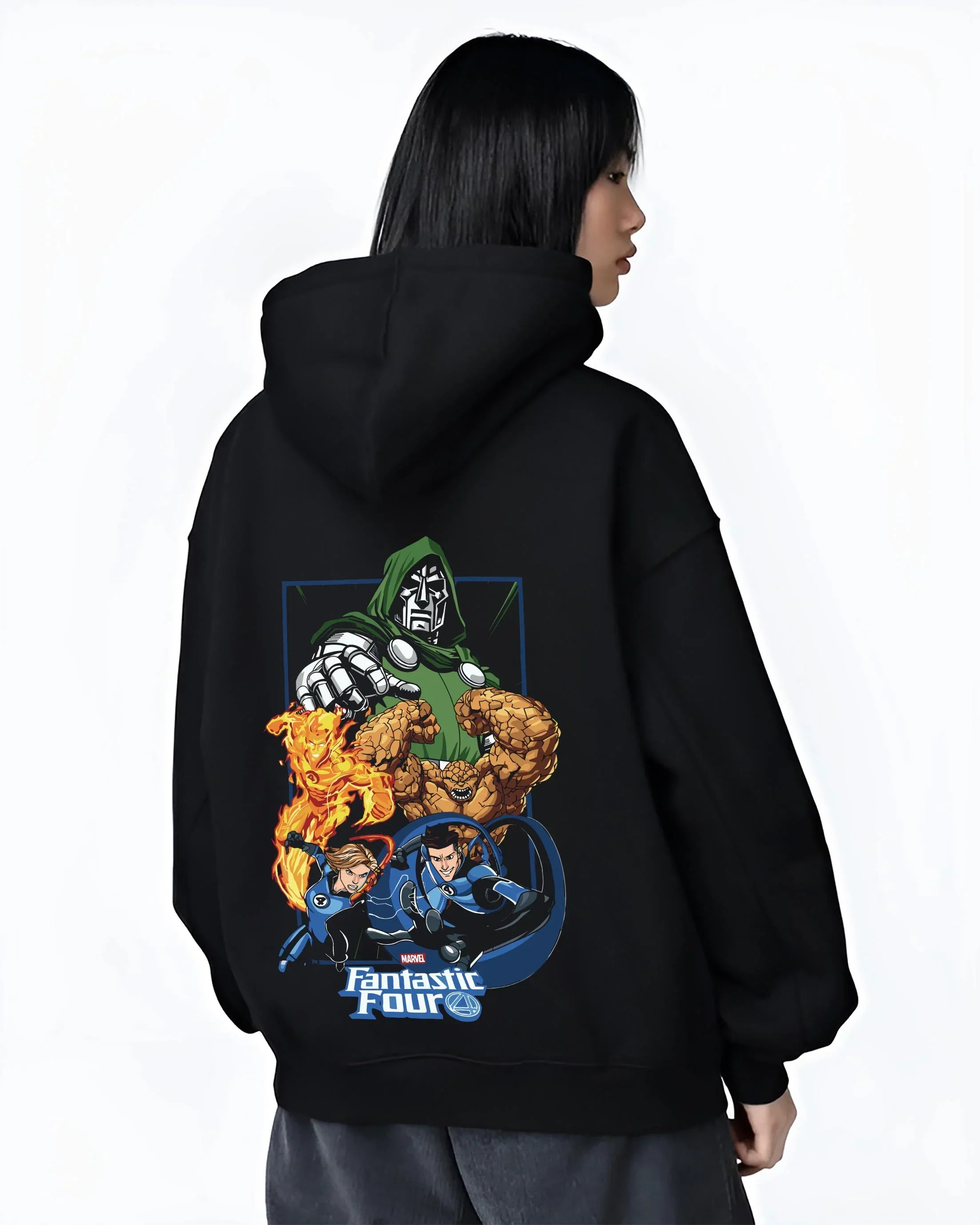 Black hoodie worn by female model, back view with Doctor Doom Hoodie Fantastic Four Retro Villain Art graphic premium wear.