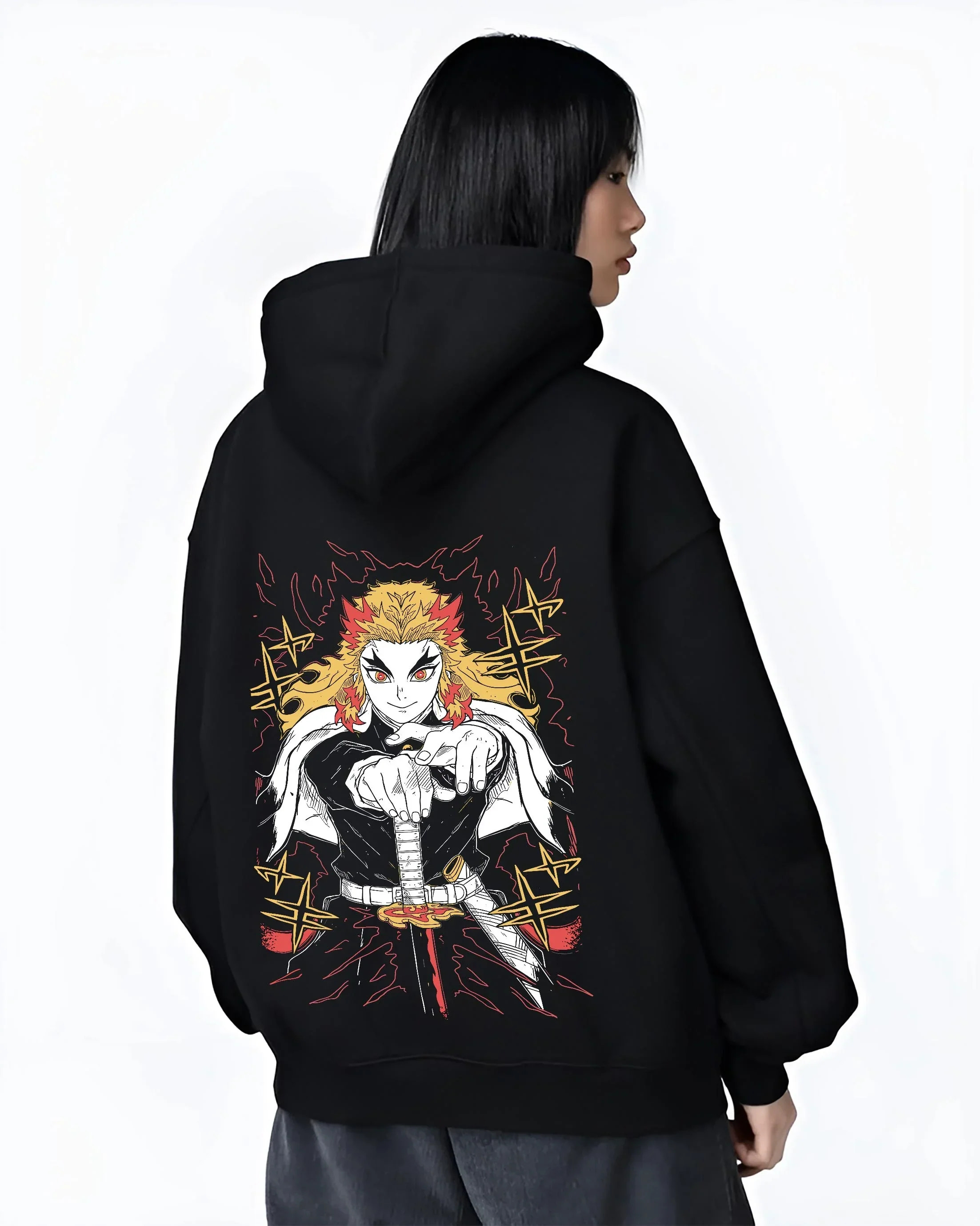 Black hoodie worn by female model, back view with Demon Slayer Rengoku Hoodie Flame Pillar Jumper graphic bold anime graphic.