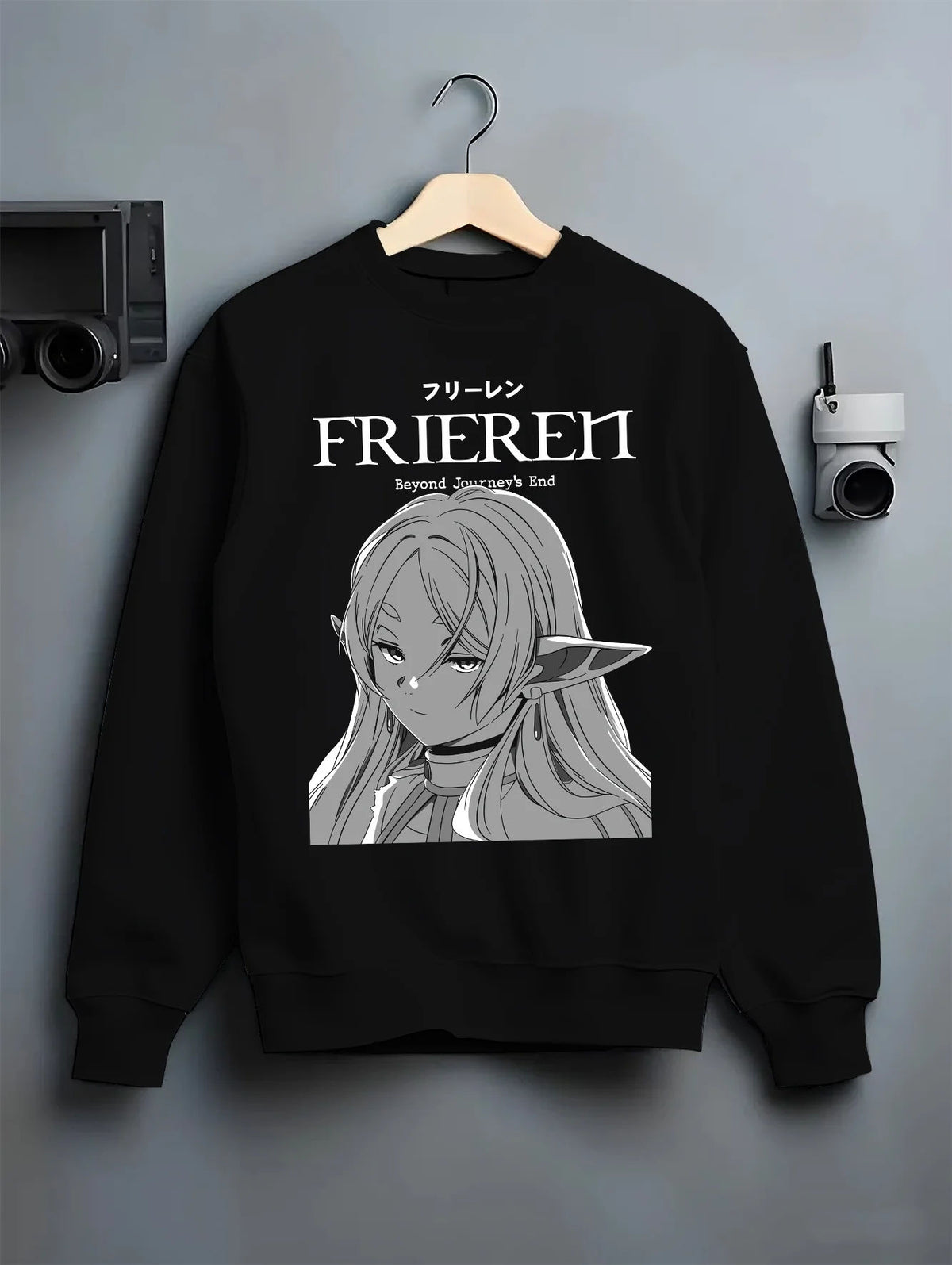 Black crewneck sweatshirt on hanger showing Frieren from Frieren: Beyond Journey's End: monochrome portrait