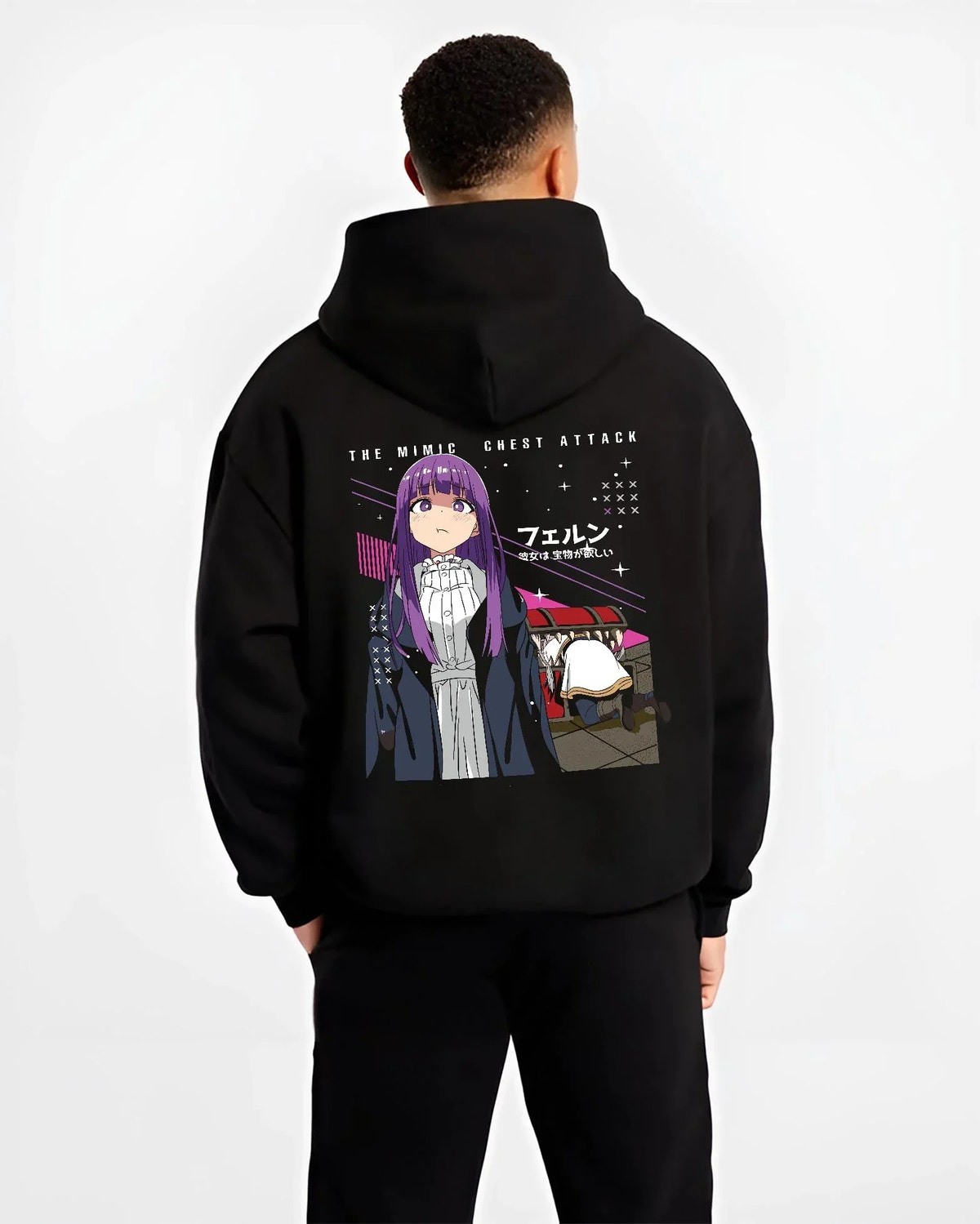 Black hoodie worn by male model, back view with Frieren Hoodie Beyond Journey’s End White Dress graphic bold anime graphic.