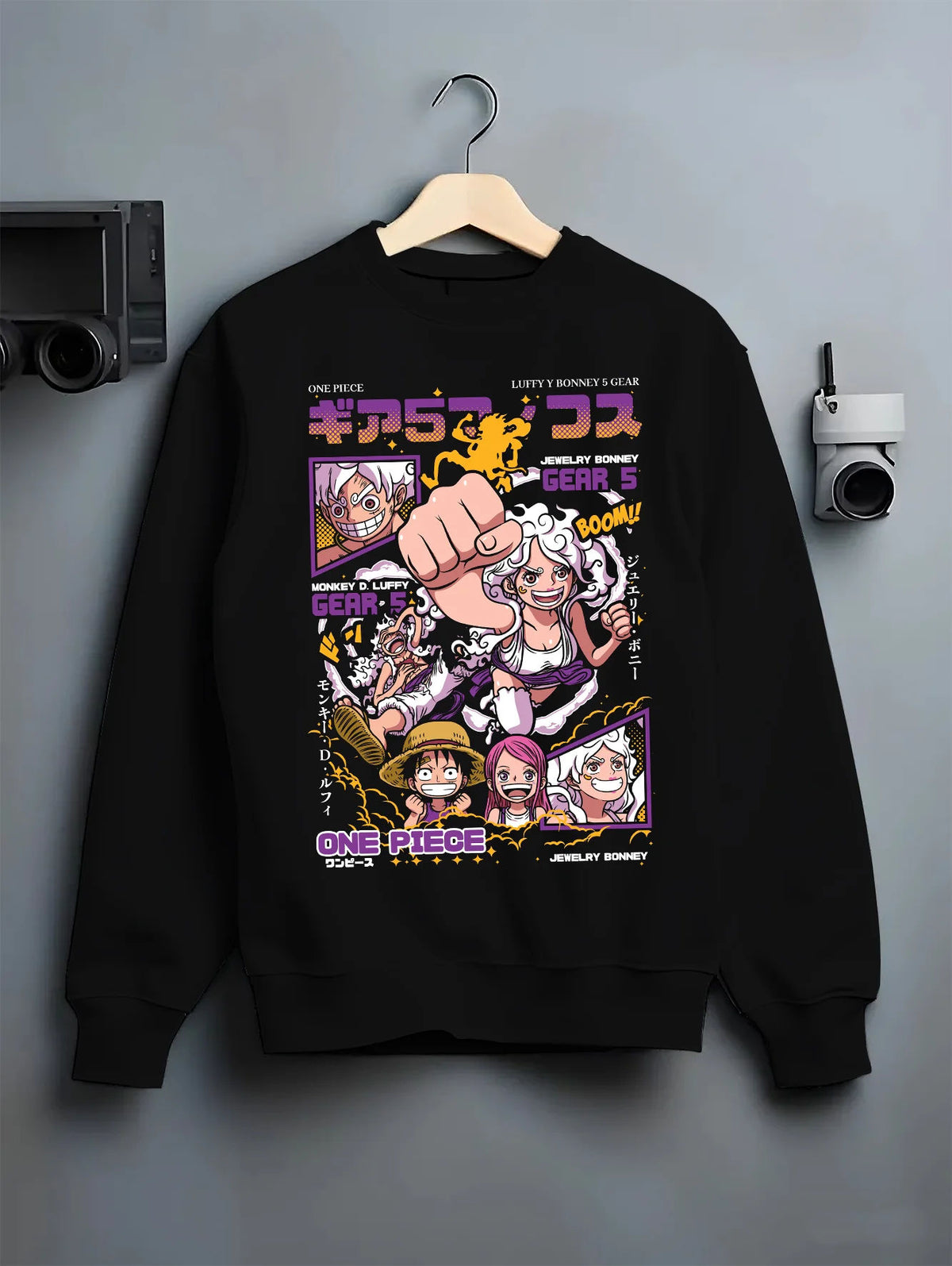 Black crewneck sweatshirt on hanger with Monkey D. Luffy Gear 5 and Jewelry Bonney Gear 5 from One Piece illustrated back