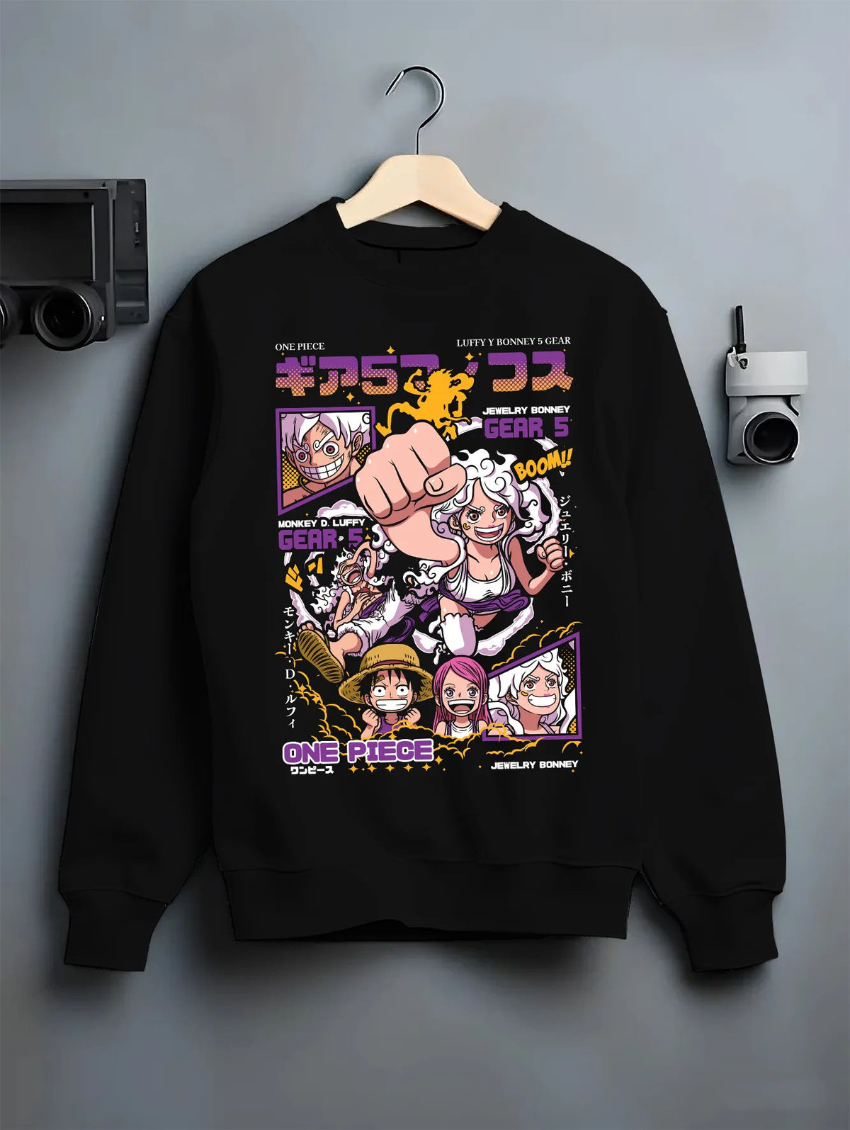 Black crewneck sweatshirt on hanger with Monkey D. Luffy Gear 5 and Jewelry Bonney Gear 5 from One Piece illustrated back