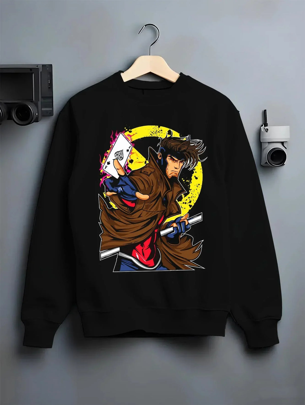 Black crewneck sweatshirt on hanger with Yu Gi Oh Hoodie Gambit Yami Yugi Duelist Jumper graphic bold anime graphic.