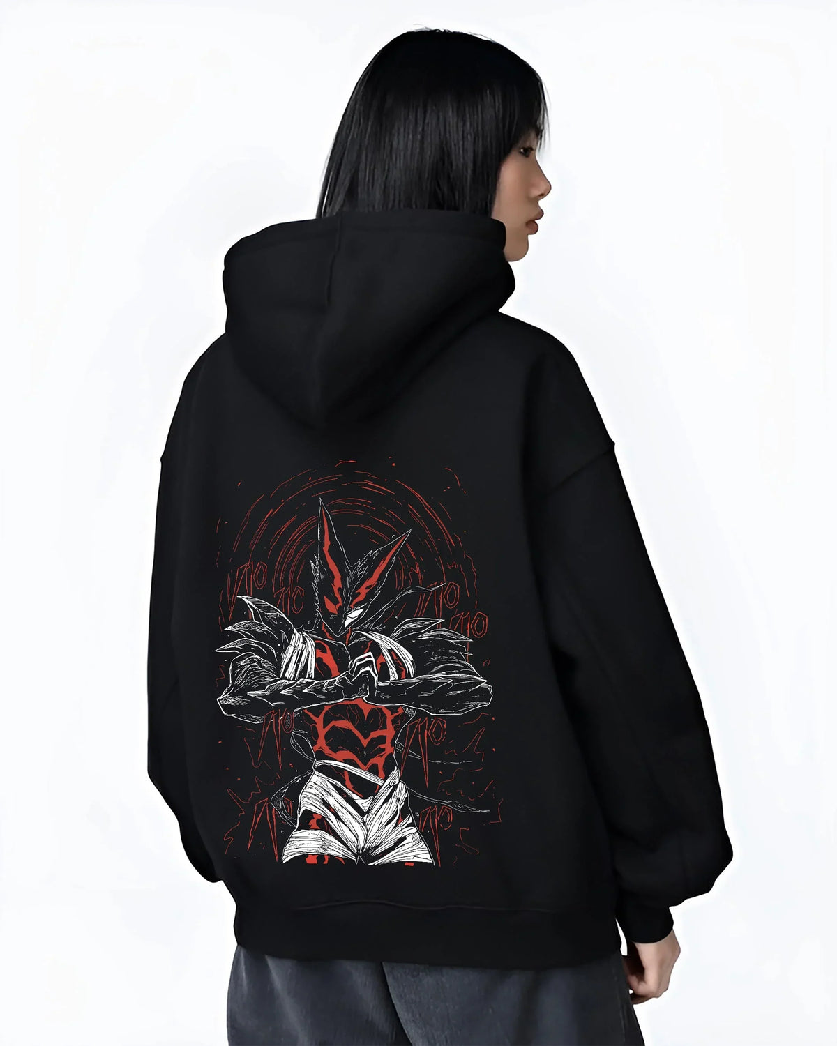 Black hoodie worn by female model, back view, featuring shonen battle character artwork of Garou with dark manga panel inspired design.