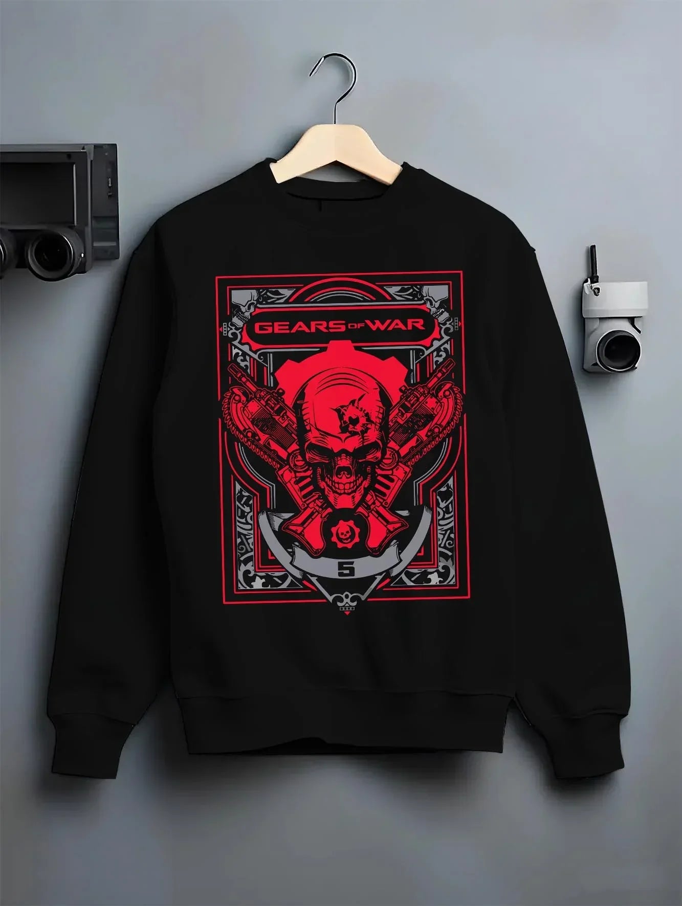 Black crewneck sweatshirt on hanger with Gears of War Hoodie Marcus Crimson Omen Skull Jumper graphic bold anime graphic.