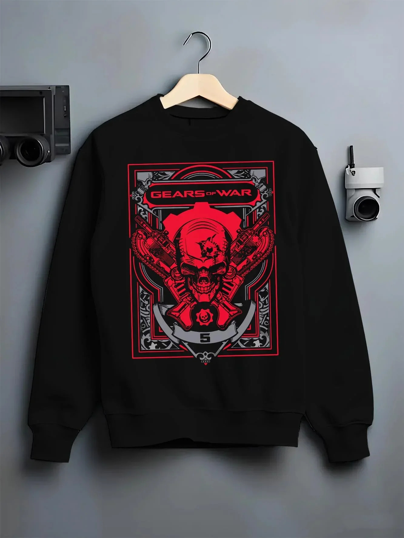 Black crewneck sweatshirt on hanger with Gears of War Hoodie Marcus Crimson Omen Skull Jumper graphic bold anime graphic.