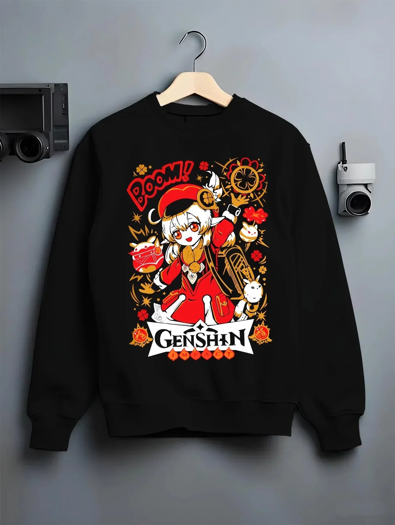 Black crewneck sweatshirt on hanger with Genshin Impact Hoodie Klee Bombastic Attack Jumper graphic streetwear graphic.