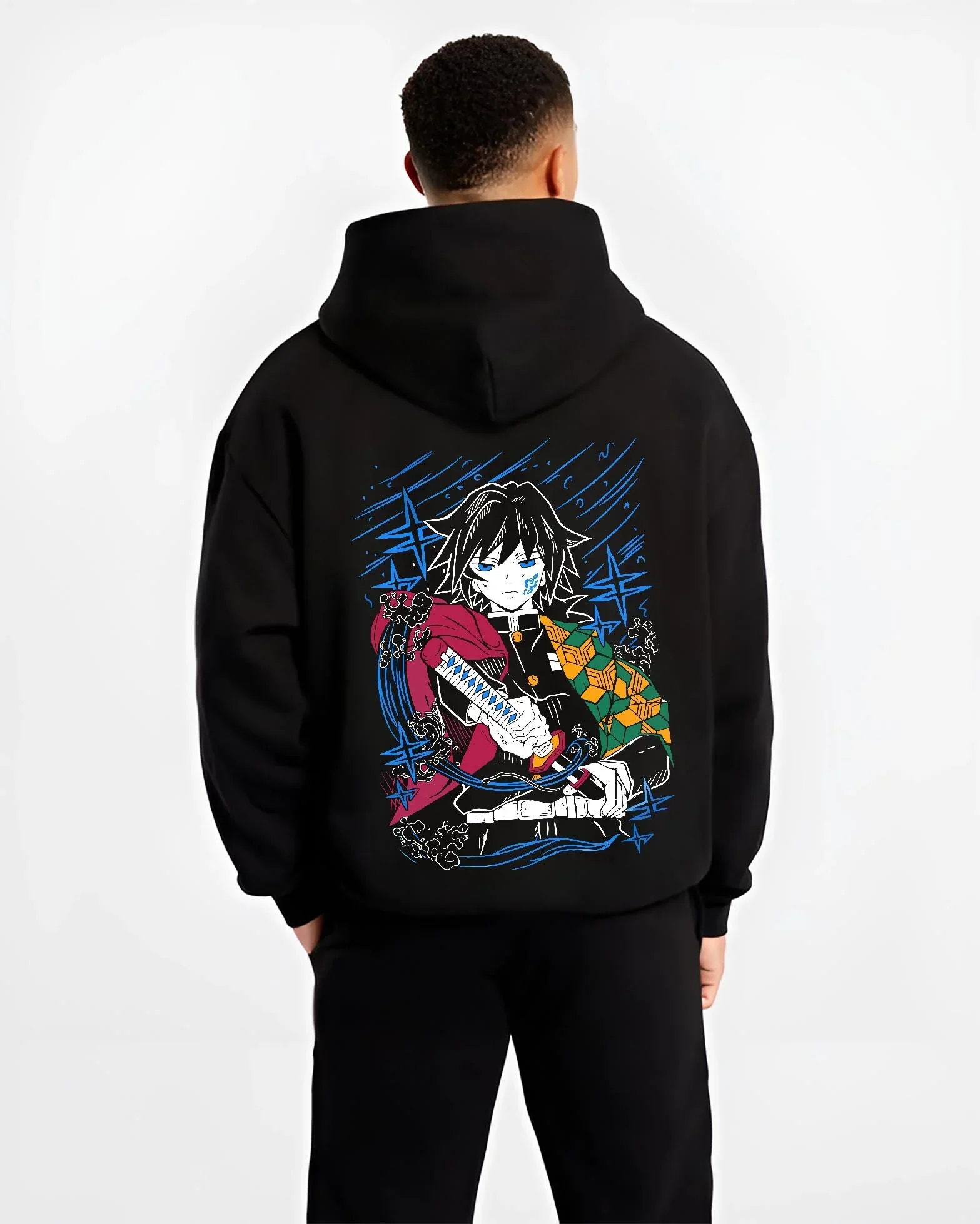 Black hoodie worn by male model, back view with Demon Slayer Hoodie Giyu Tomioka Water Hashira Jumper graphic streetwear graphic.