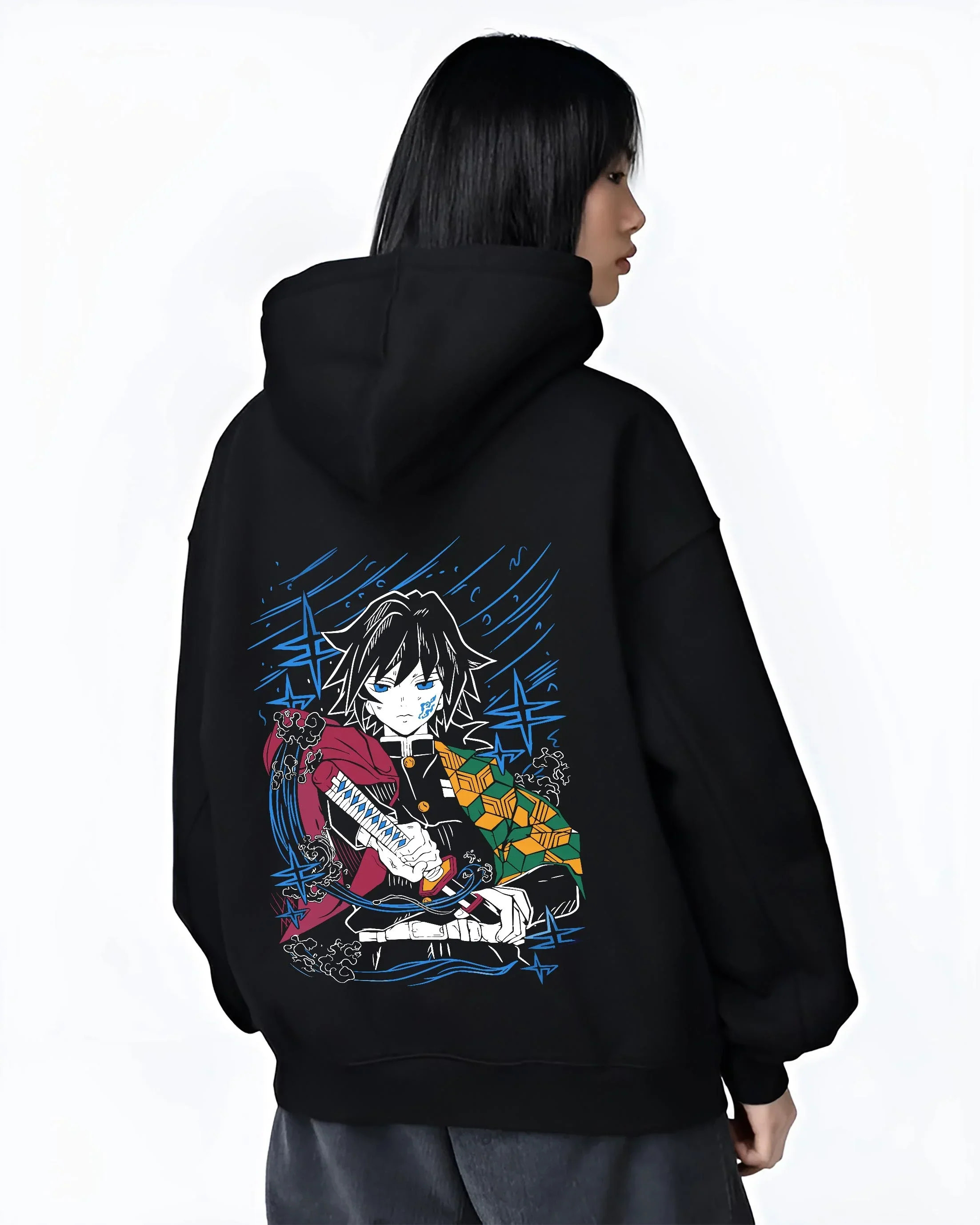 Black hoodie worn by female model, back view with Demon Slayer Hoodie Giyu Tomioka Water Hashira Jumper graphic bold anime graphic.