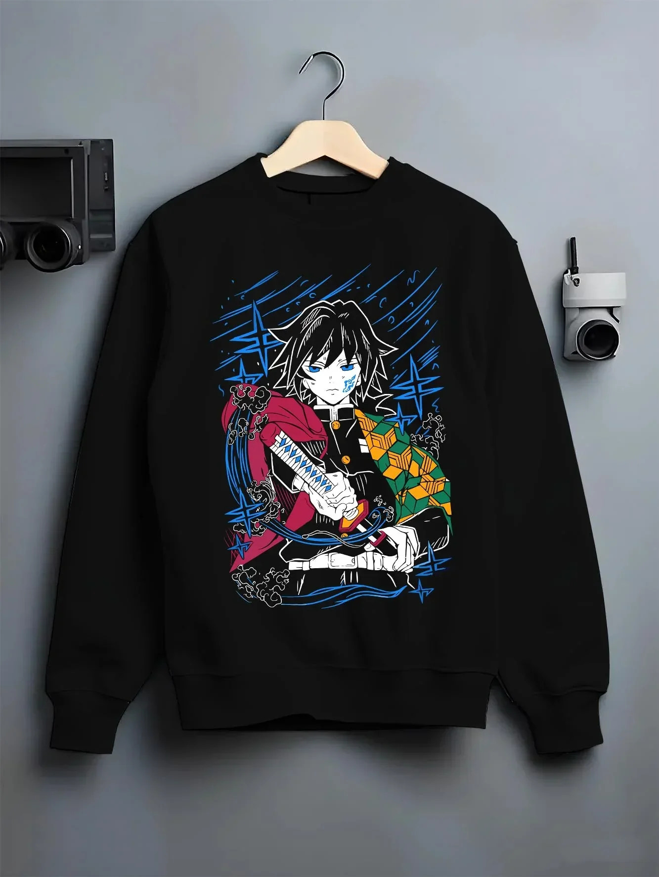 Black crewneck sweatshirt on hanger with Demon Slayer Hoodie Giyu Tomioka Water Hashira Jumper graphic streetwear graphic.