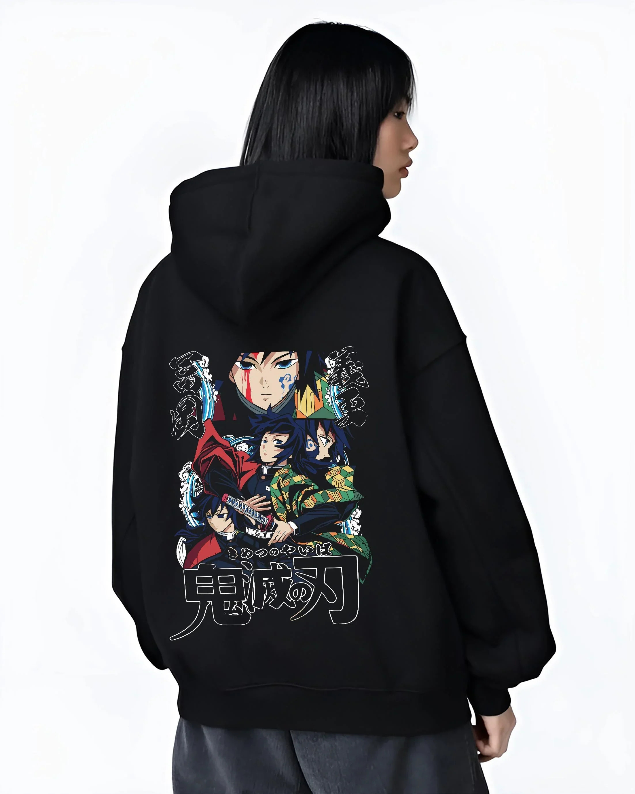 Black hoodie worn by female model, back view with Demon Slayer Hoodie Giyu Tomioka Water Pillar Jumper graphic bold anime graphic.