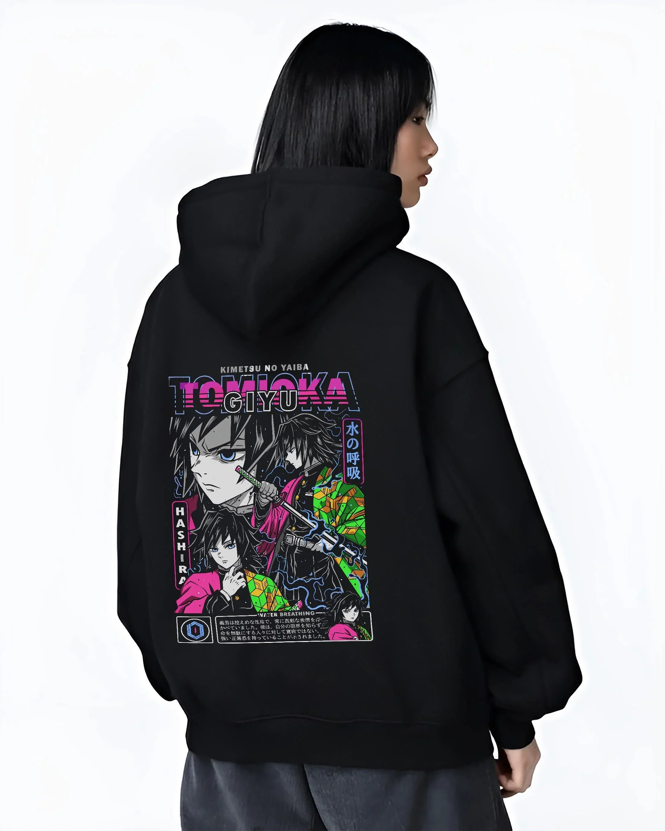 Black hoodie worn by female model, back view with Demon Slayer Hoodie Giyu Tomioka Hashira Guard Jumper graphic bold anime graphic.