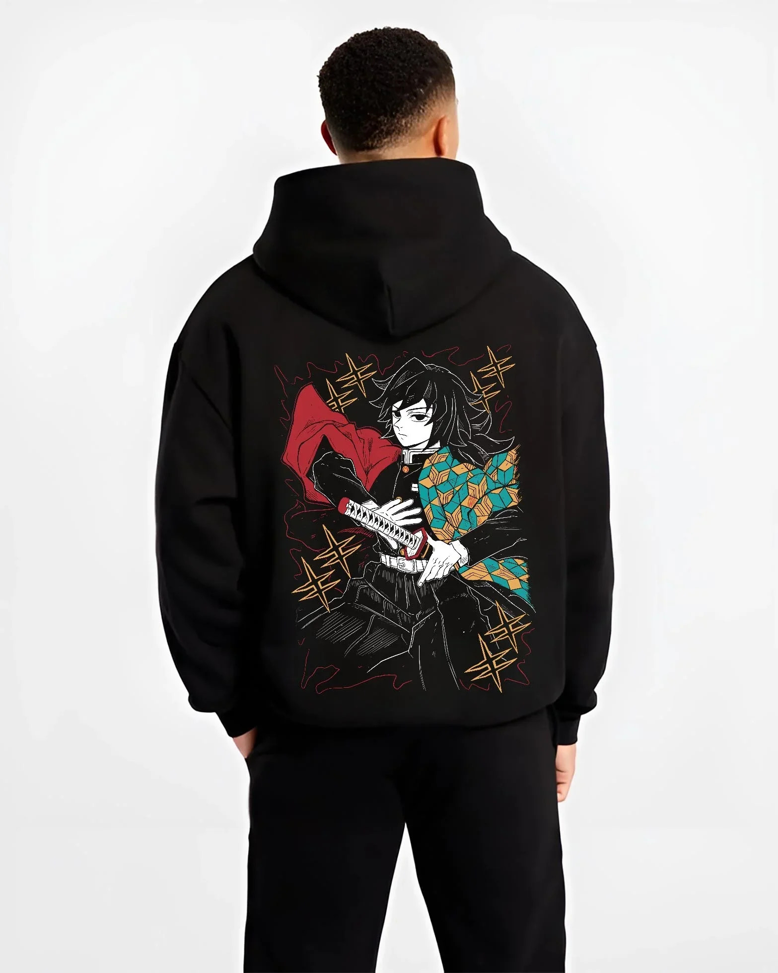 Black hoodie worn by male model, back view with Demon Slayer Hoodie Giyu Tomioka Swift Strike Jumper graphic premium wear.
