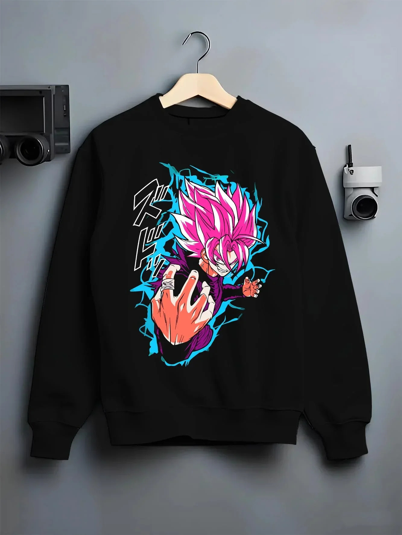 Black crewneck sweatshirt on hanger with Goku Hoodie Dragon Ball Z Super Saiyan Rose Aura graphic streetwear graphic.