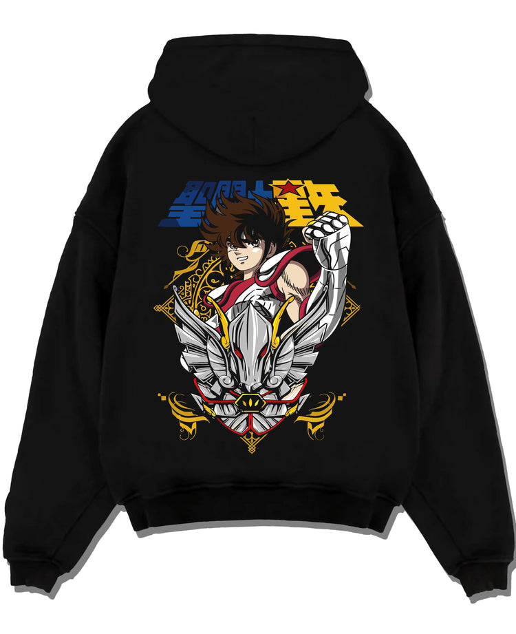 Black hoodie laid flat featuring Pegasus Seiya Saint Seiya gold wings artwork.