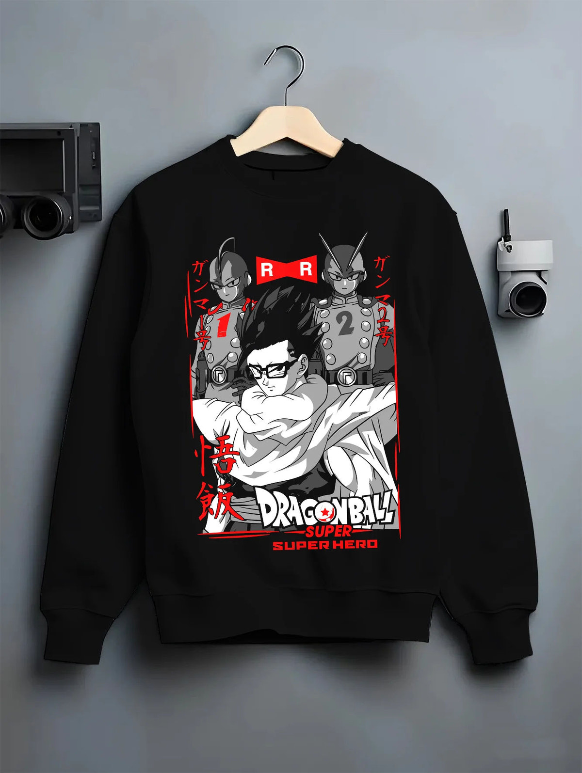 Black crewneck sweatshirt on hanger with Son Gohan / Dragon Ball Z and Super montage illustrated back graphic