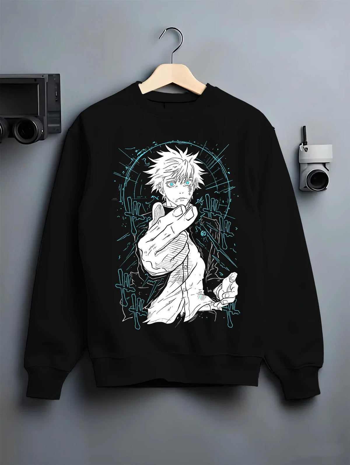 Black crewneck sweatshirt on hanger featuring Gojo Satoru Six Eyes blue energy artwork.