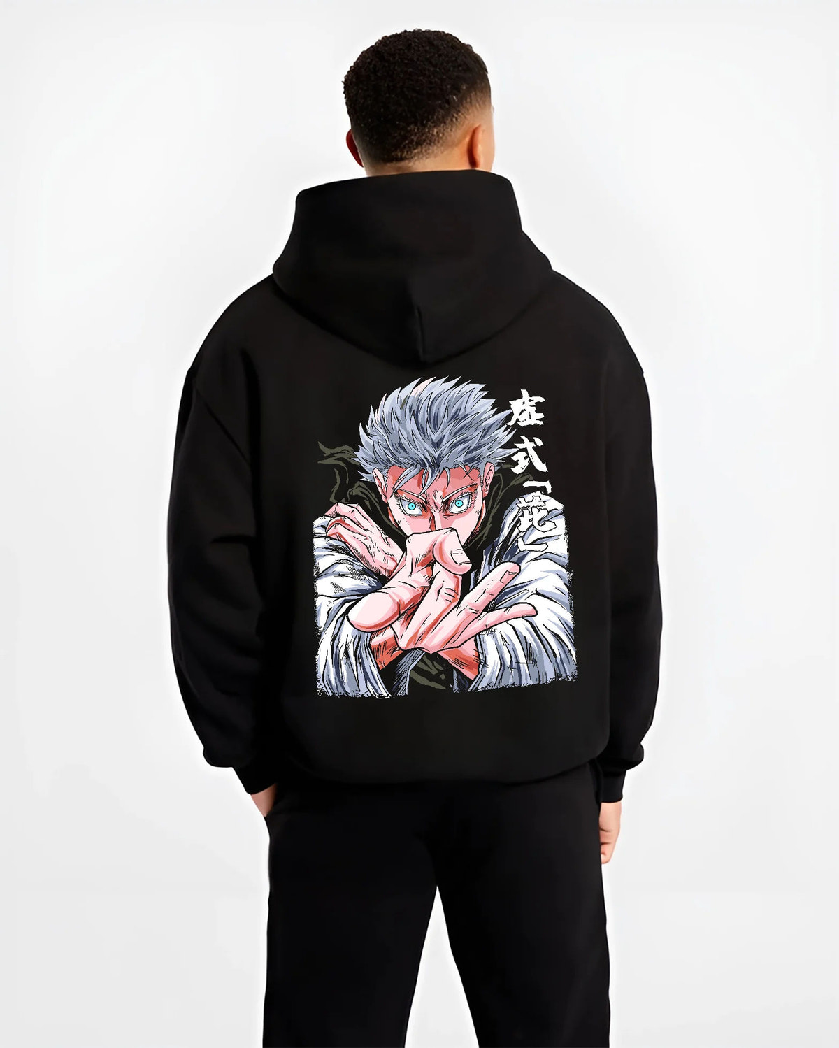 Black hoodie model back view showing white-haired Jujutsu Kaisen fighter: hand-sign portrait